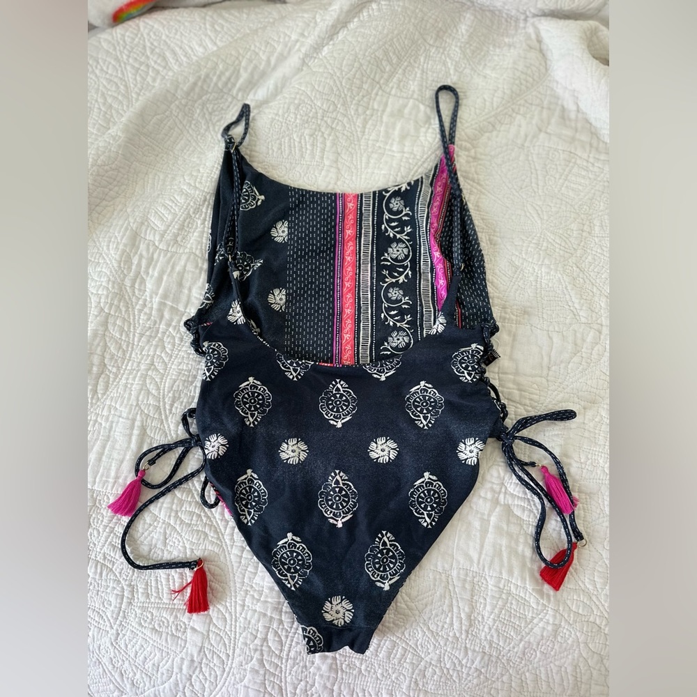 Rusty Reversible one piece, size small